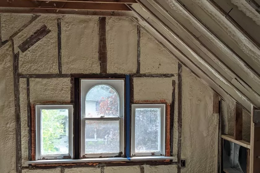 Attic with spray foamed walls