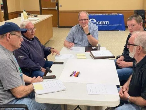 community members around a table