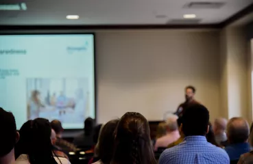 people watching a presentation