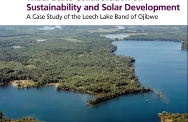 Graphic image reading, "Tribal-State Collaboration on Sustainability and Solar Development" below text is an aerial image of a bright blue body of water surrounded by a green land mass.